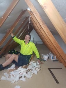Man working on the Attic.