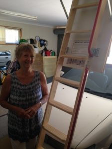 Woman and Attic Ladder.