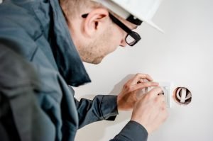 Man working on Electrical.