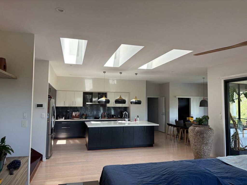 Three skylights installed above kitchen island in Brisbane home